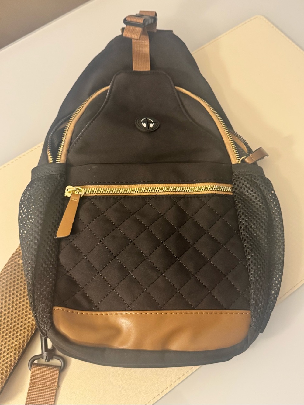 Quilted Black & Tan Sling Backpack with Gold Hardware